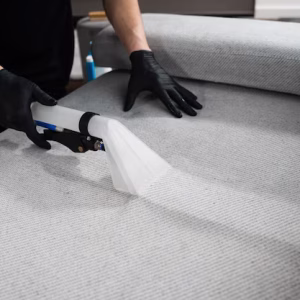 using-extractor-refresh-clean-from-dust-stains-upholstered-furniture-cleaner-is-drycleaning-sofa-using-extractor-machine-with-detergent_255847-13559